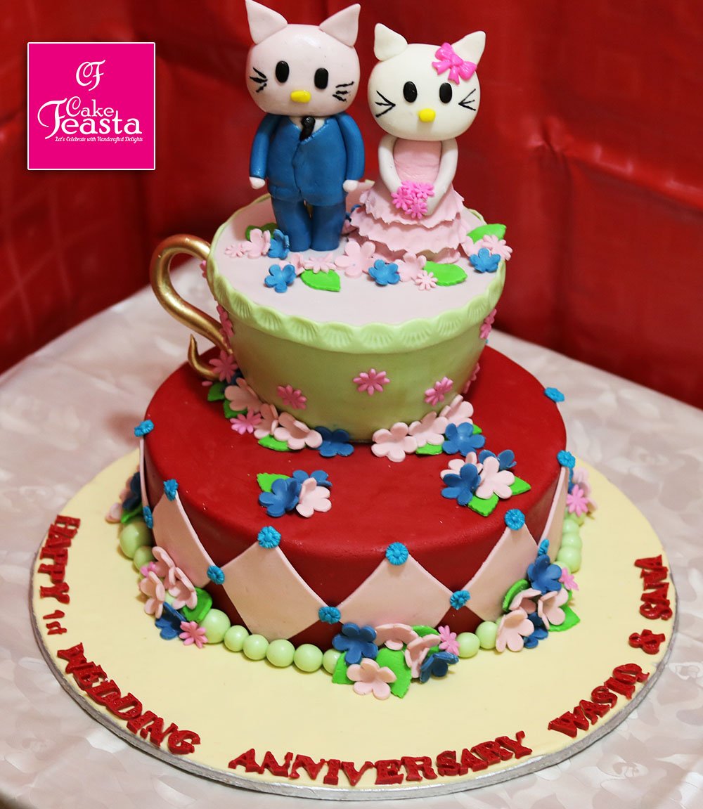 Male Female Katty Birthday Cake - Customized Cakes in Lahore