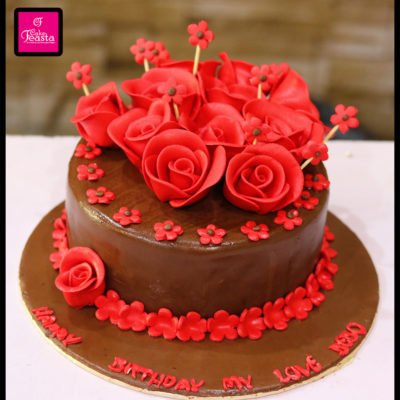 Red Flower On Brown Cake